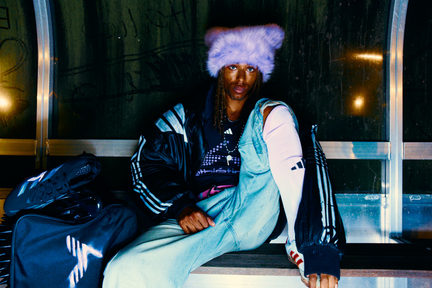 Adidas X Huni — seated portrait in the dugout