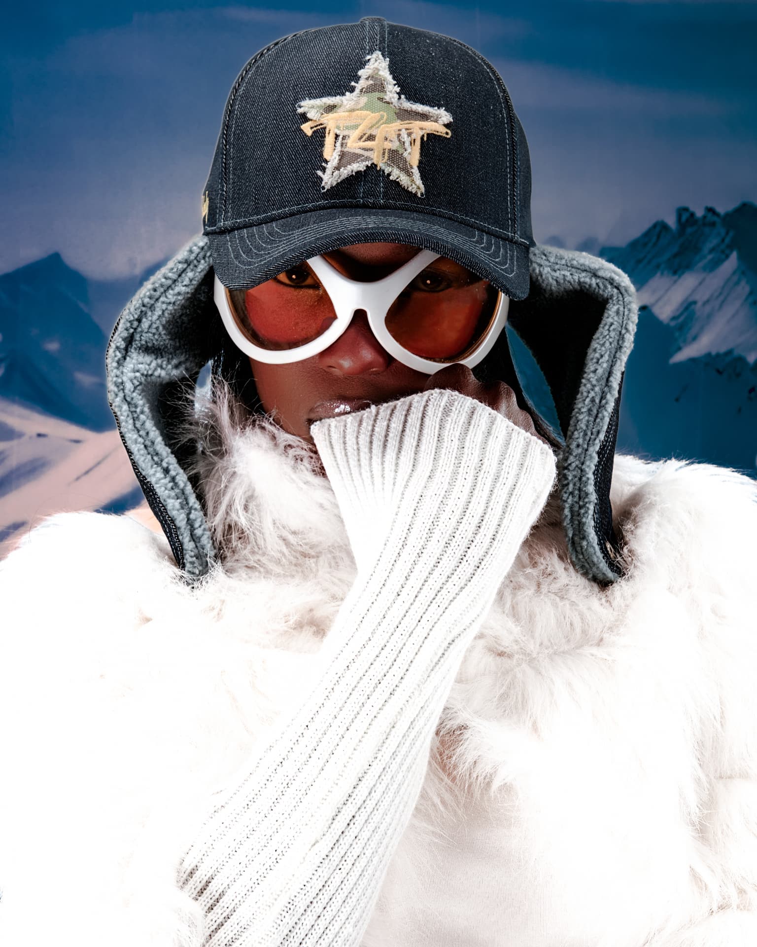 Tit4Tat — portrait in white goggles and fur