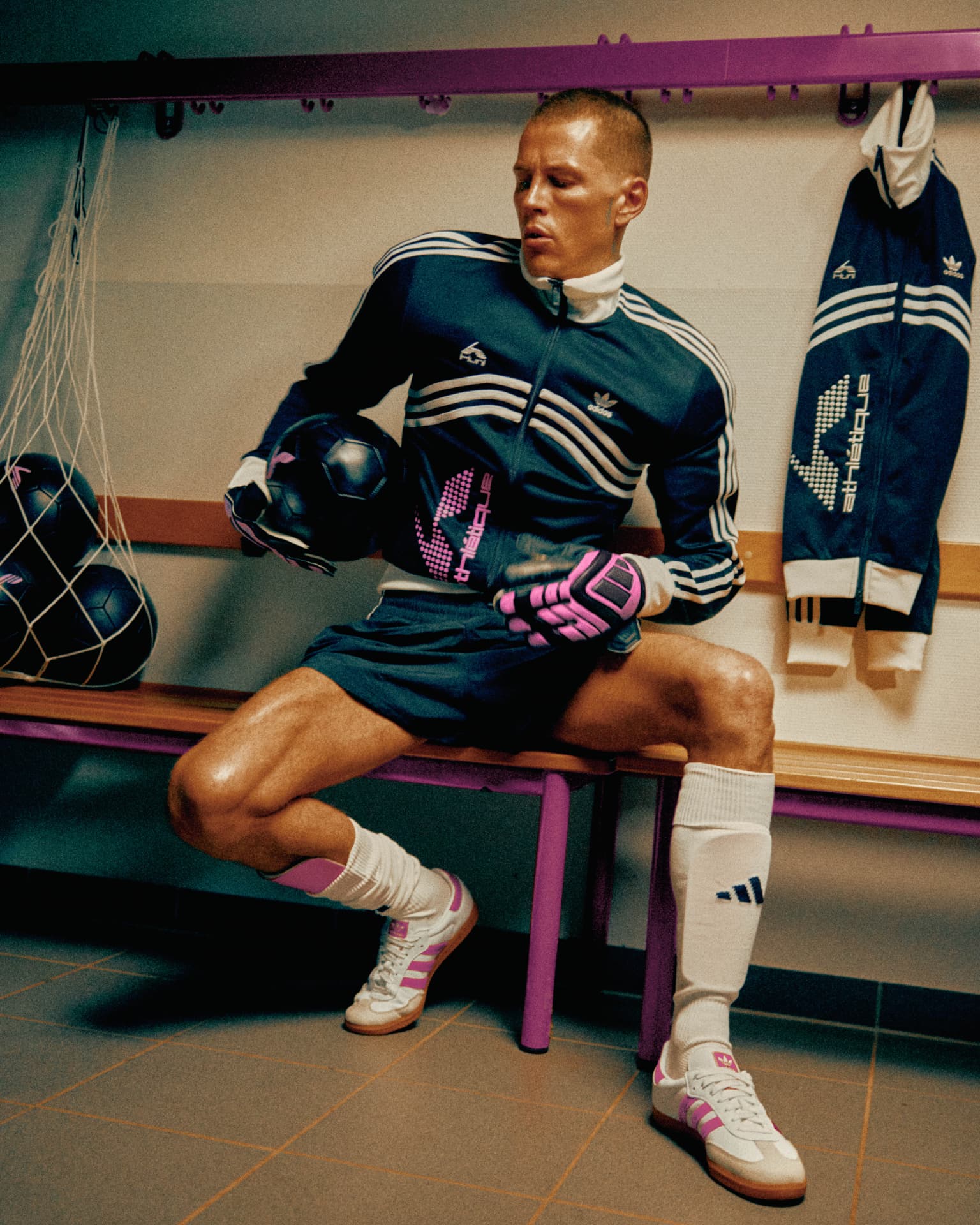 Adidas X Huni — footballer seated in the changing room