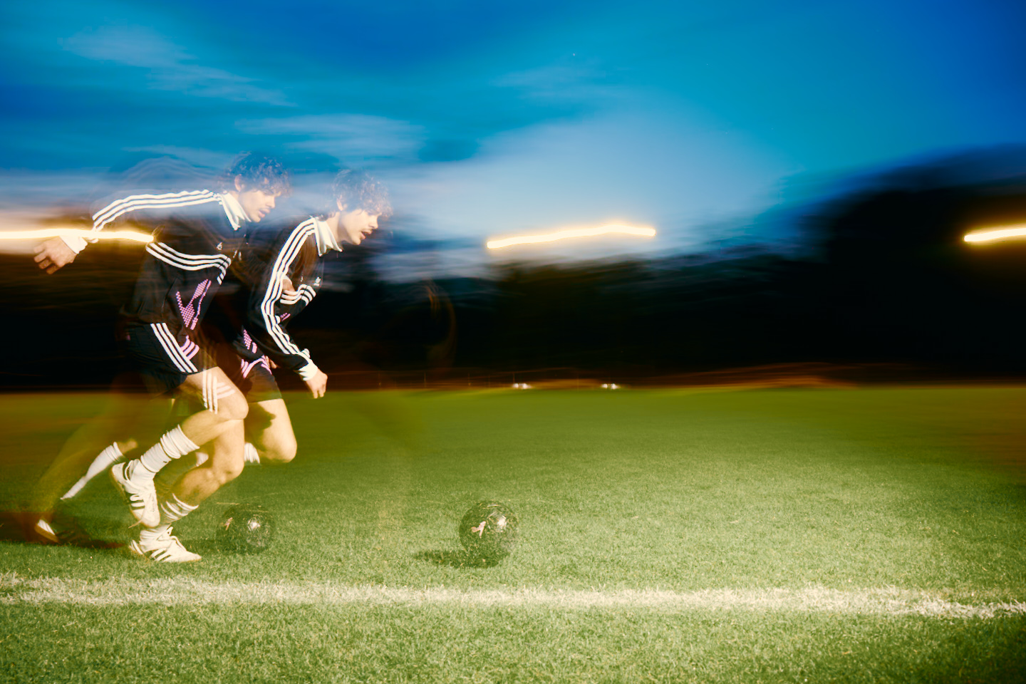 Adidas X Huni — footballer sprinting across the pitch